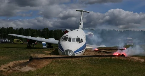 Training of rescuers on a burning plane Stock Footage 90688415