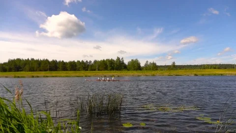 Training in rowing on the lake. Slow motion. Stock Footage 77482949