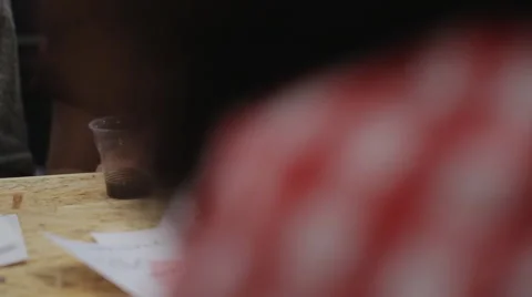 Training session on lettering in the school work. she draws and creates a Stock Footage 57770253