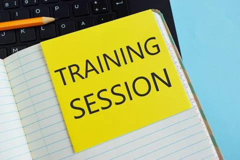 Training session memo written in notebook with pencil. Business photo concept Stock Photos