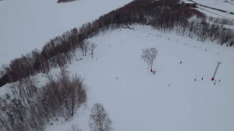 The training slope of the ski complex in the city during the day Stock Footage 170259323