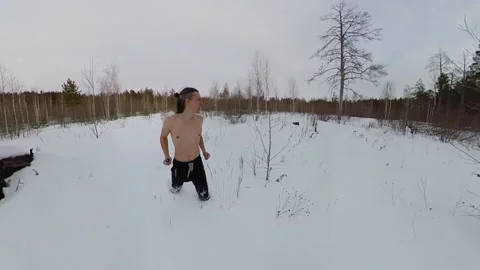 Training in the winter forest. Slow motion 2x. Stock Footage 150805152