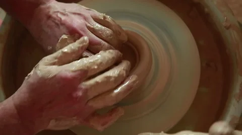 Training to work on the potter's wheel Stock Footage 65186399
