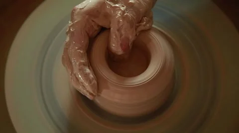 Training to work on the potter's wheel Stock Footage 65186406