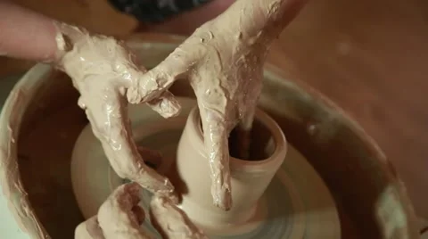 Training to work on the potter's wheel Stock Footage 65186428