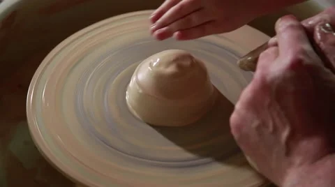 Training to work on the potter's wheel Stock Footage 65186440