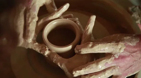 Training to work on the potter's wheel Stock Footage 65186844