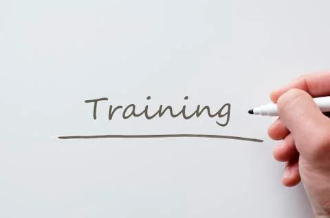 Training written on whiteboard Stock Photos