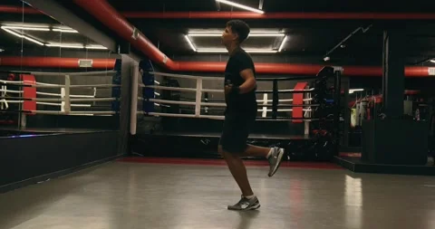 Training of a young boxer with a rope. Stock Footage 275280223