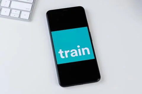 Trainline app logo on a smartphone screen Stock Photos