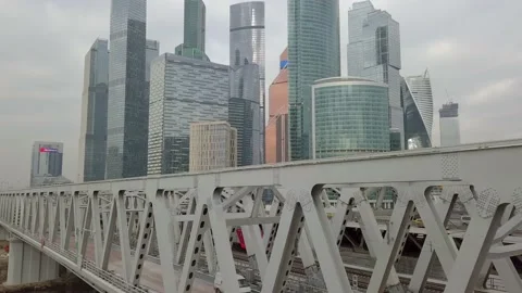 Trains and road traffic overlooking Downtown Stock Footage 163667293