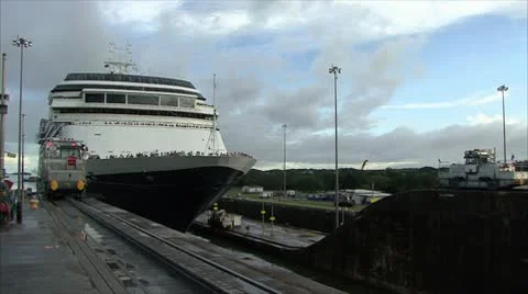 Trains are pulling a cruise ship in the Panama Canal Time-lapse HD Stock Footage 10799340