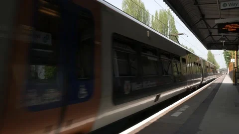 Trains arriving leaving platform Stock Footage 172112430