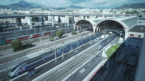 Trains coming and going on the Nice train station Stock Footage 232578760