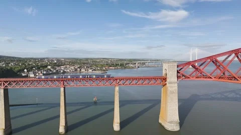 Trains on Forth Bridge from a drone, Forth Estuary, Scotland Stock-Footage 317307543