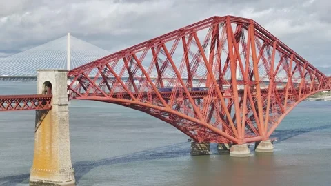 Trains on Forth Bridge from a drone, Forth Estuary, Scotland Stock-Footage 317307576