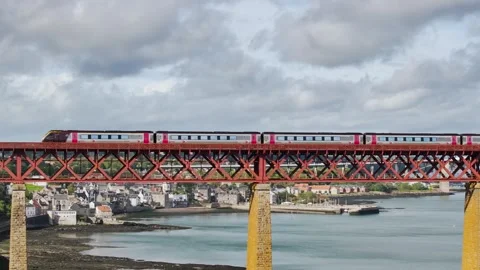 Trains on Forth Bridge from a drone, Forth Estuary, Scotland Stock-Footage 317307622