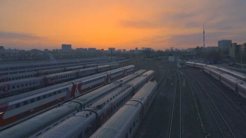 Trains on a large railway junction at sunset Stock Footage 89251305