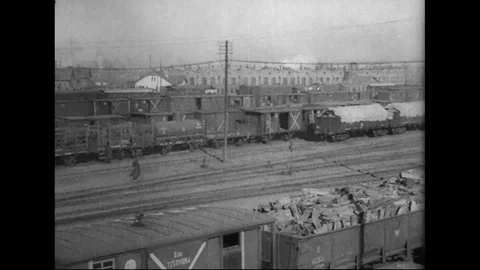 Trains with loaded goods at Harbin Station - 1918-1919 Stock Footage 86484712