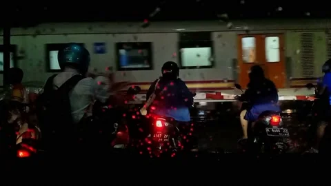 Trains pass through the middle of the city Stock Footage 142592982