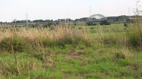 Trains passing a bridge Stock Footage 27484329