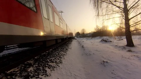 Trains passing by at sunset Vídeo Stock 71722270