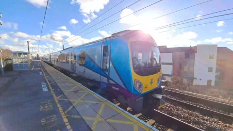 Trains picking up passengers Stock Footage 233828376