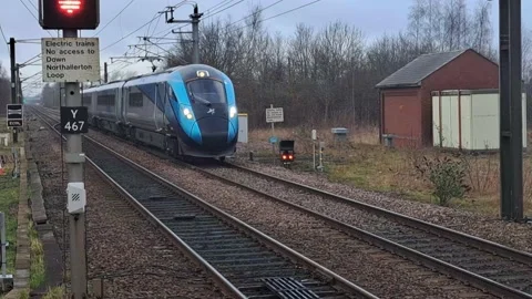 Trains picking up passengers Stock Footage 234420185