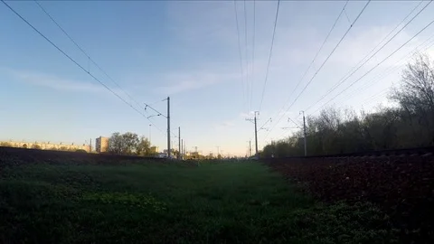Trains on the railway at sunset timelapse 스톡 동영상 77283949
