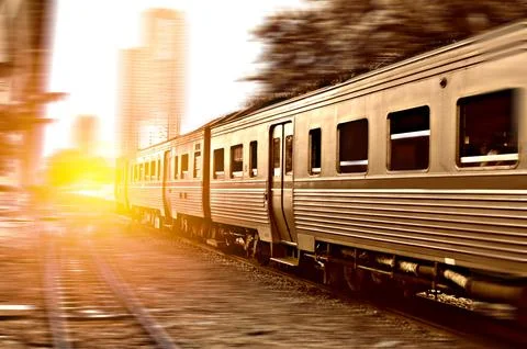 Trains running on the tracks in the evening Stock Photos