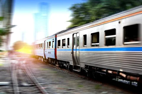 Trains running on the tracks in the evening Stock Photos