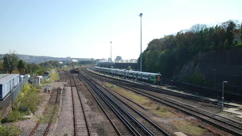 Trains speed into Brighton 库存影片 199628355