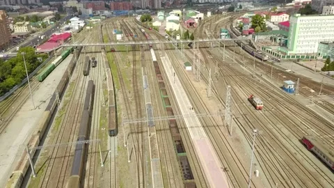 Trains at train stations with many tracks Stock Footage 139059978