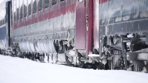 Trains waiting in train station after heavy snowfall Vídeo Stock 71463449