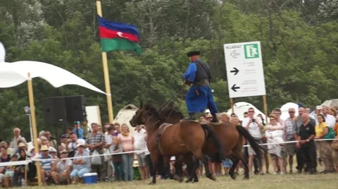 Traitional Riding front of National Flags Stock Footage 50741844