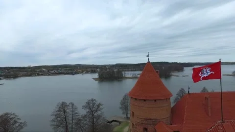  Trakai Island Castle in Lithuania on a cloudy day with views of the surrounding Stock Footage 328910011