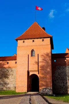 Trakai, lithuania: central tower of castle with flag Stock Photos