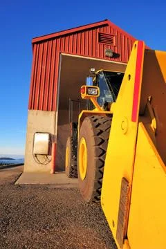 Traktor and building Stock Photos