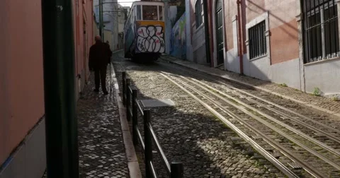 Tram 28 in famous Bica funicular, near Bairro Alto, Lisbon, Portugal Stock Footage 59120952