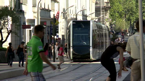 Tram approaches stop (3) - Tours France Stock Footage 32134751