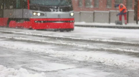 Tram arriving to the frozen platform during storm Stock Footage 59645760