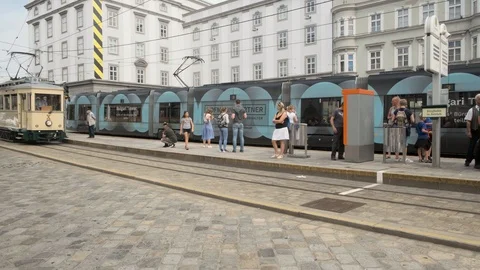 Tram arriving at the main square stop in Linz, Austria Stock Footage 115945709