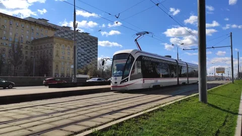 Tram is arriving at a stop in Moscow Stock Footage 201246339