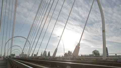 Tram on Bridge passing close to camera Stock Footage 151415665