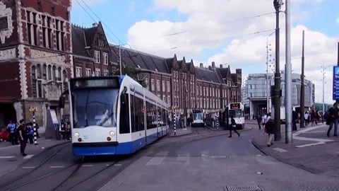  Tram for Central Station in Amsterdam. Stock Footage 84559155