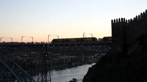 Tram crossing bridge in Porto.mp4 Stock Footage 58632852