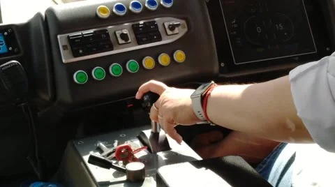 The tram driver moves the speed switch in the cab Stock Footage 201813843