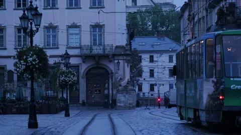 Tram drives through rynok square in Lviv Stock Footage 166503225