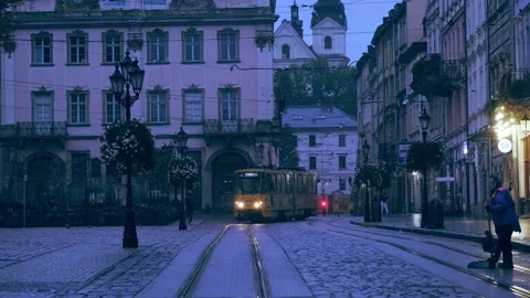 Tram drives through rynok square in Lviv Stock Footage 166504105