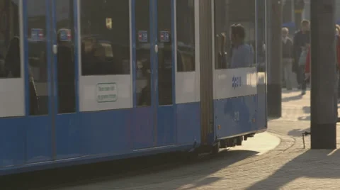 Tram driving - reflection of people - graded Stockbeeldmateriaal 58667387